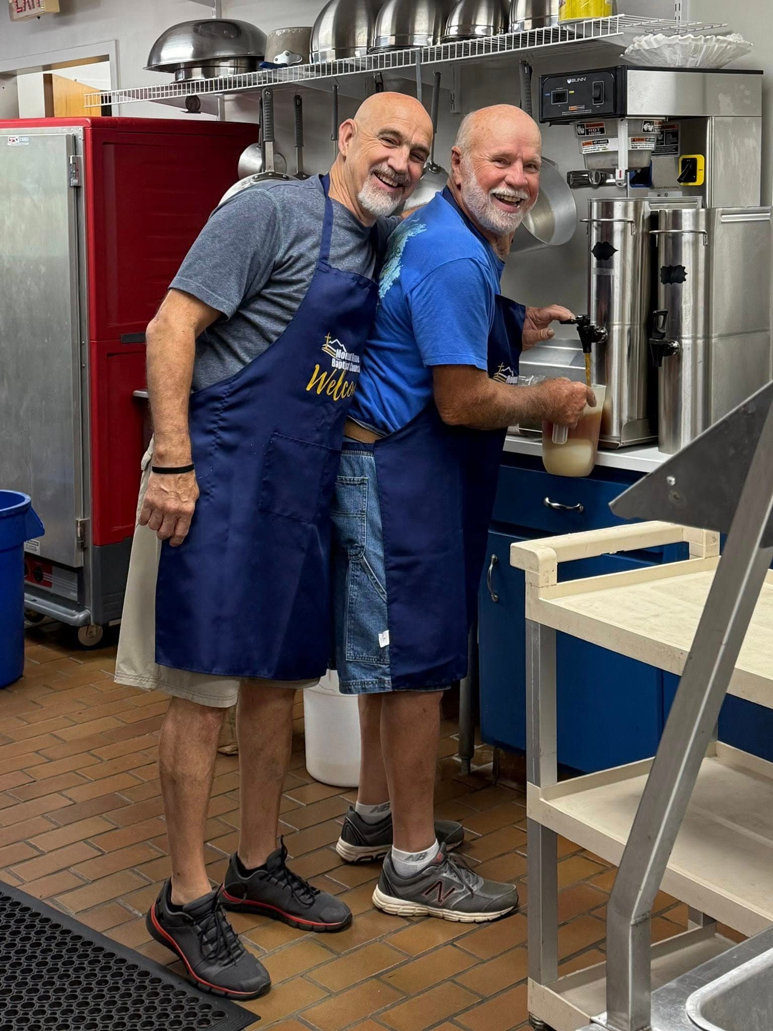 Volunteer helping in the kitchen at Mount Home